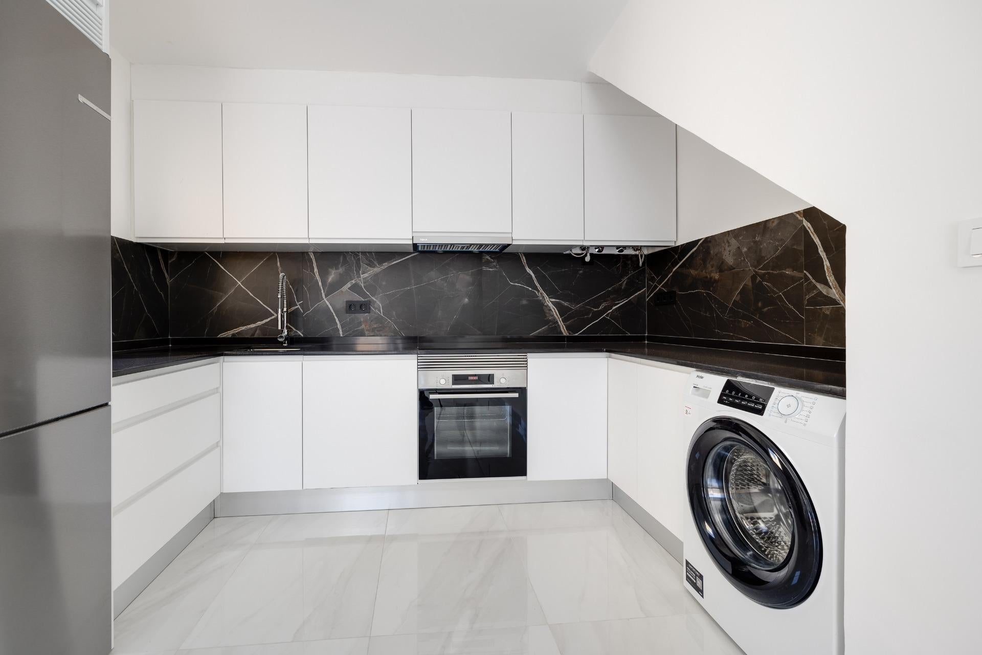 Renovated duplex penthouse with private solarium and communal pool