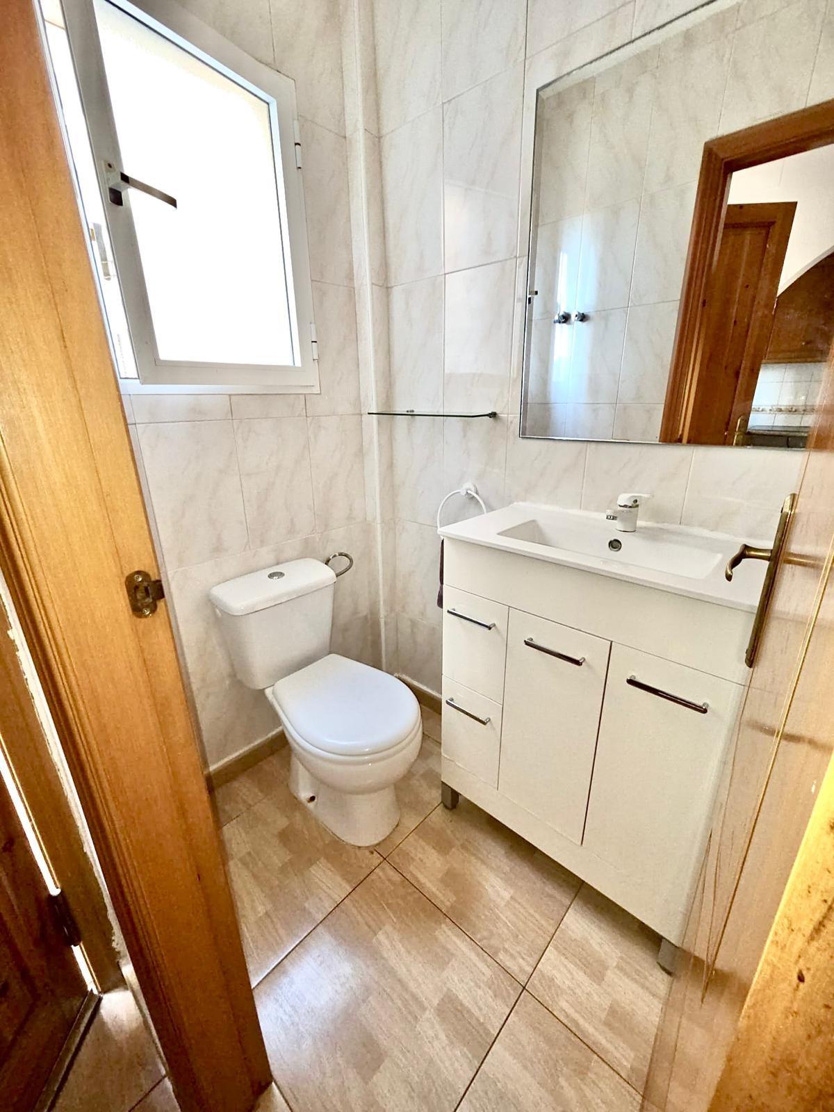 Townhouse with garage, solarium and pool in Laguna, Orihuela Costa