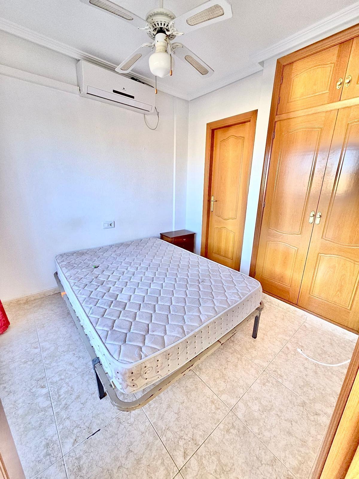 Townhouse with garage, solarium and pool in Laguna, Orihuela Costa