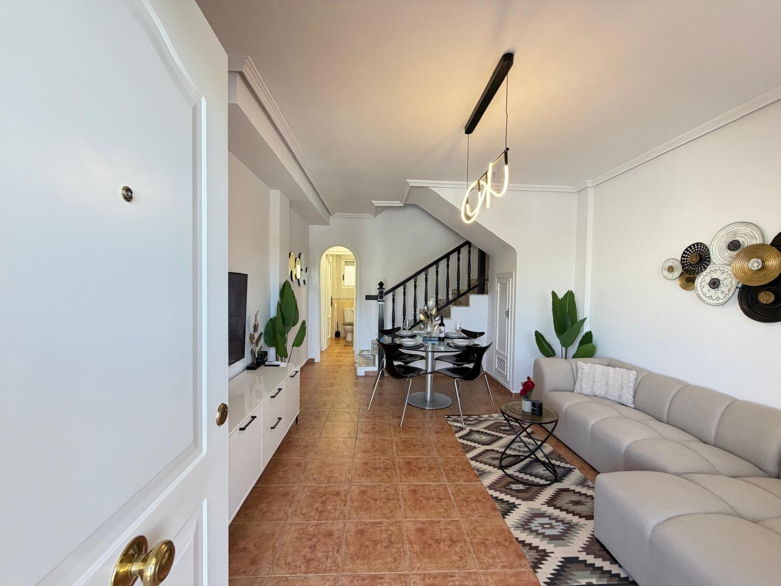 Renovated townhouse in Punta Prima — 3 bedrooms, garden and pool