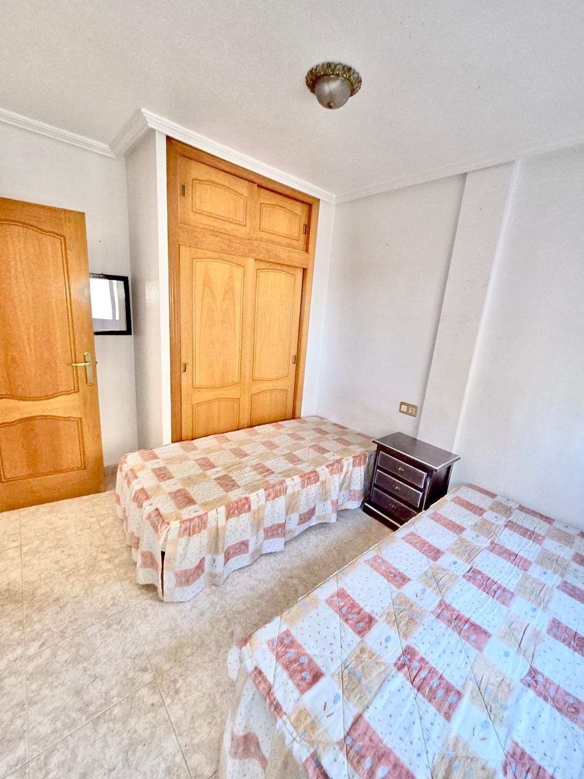Townhouse with garage, solarium and pool in Laguna, Orihuela Costa