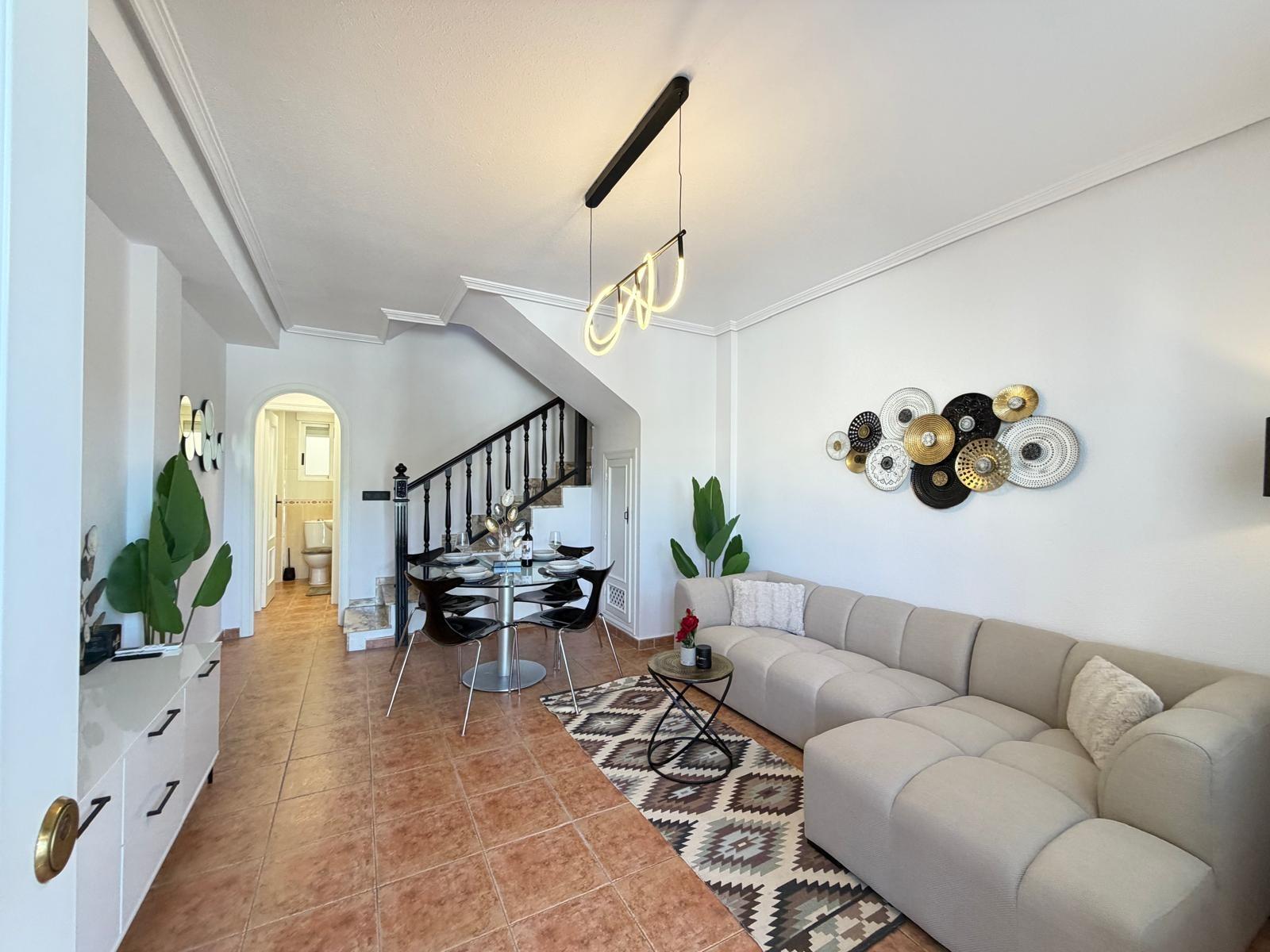 Renovated townhouse in Punta Prima — 3 bedrooms, garden and pool