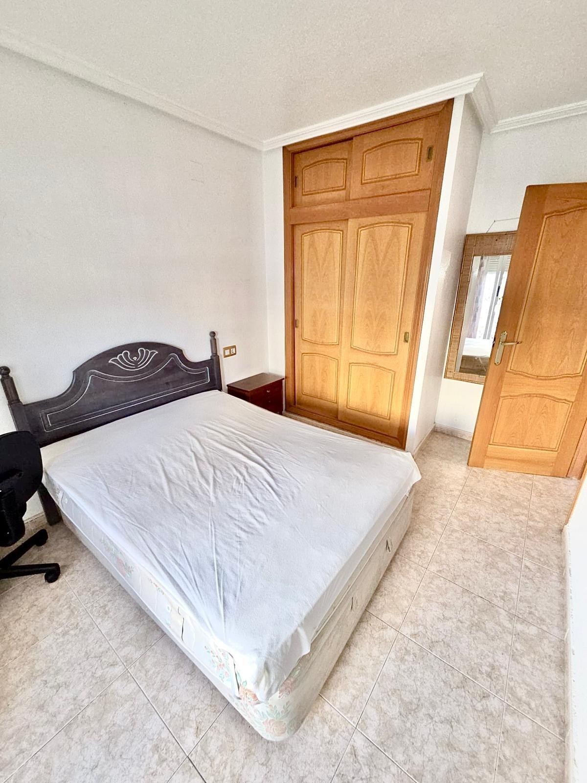 Townhouse with garage, solarium and pool in Laguna, Orihuela Costa