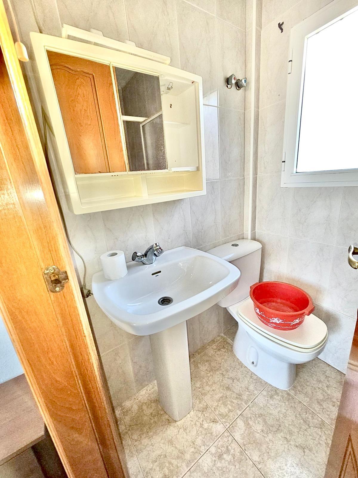 Townhouse with garage, solarium and pool in Laguna, Orihuela Costa