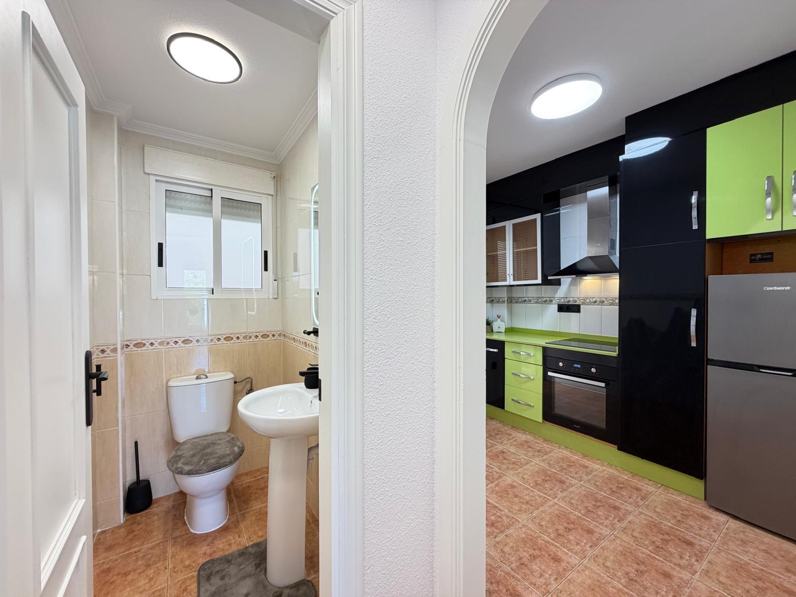 Renovated townhouse in Punta Prima — 3 bedrooms, garden and pool