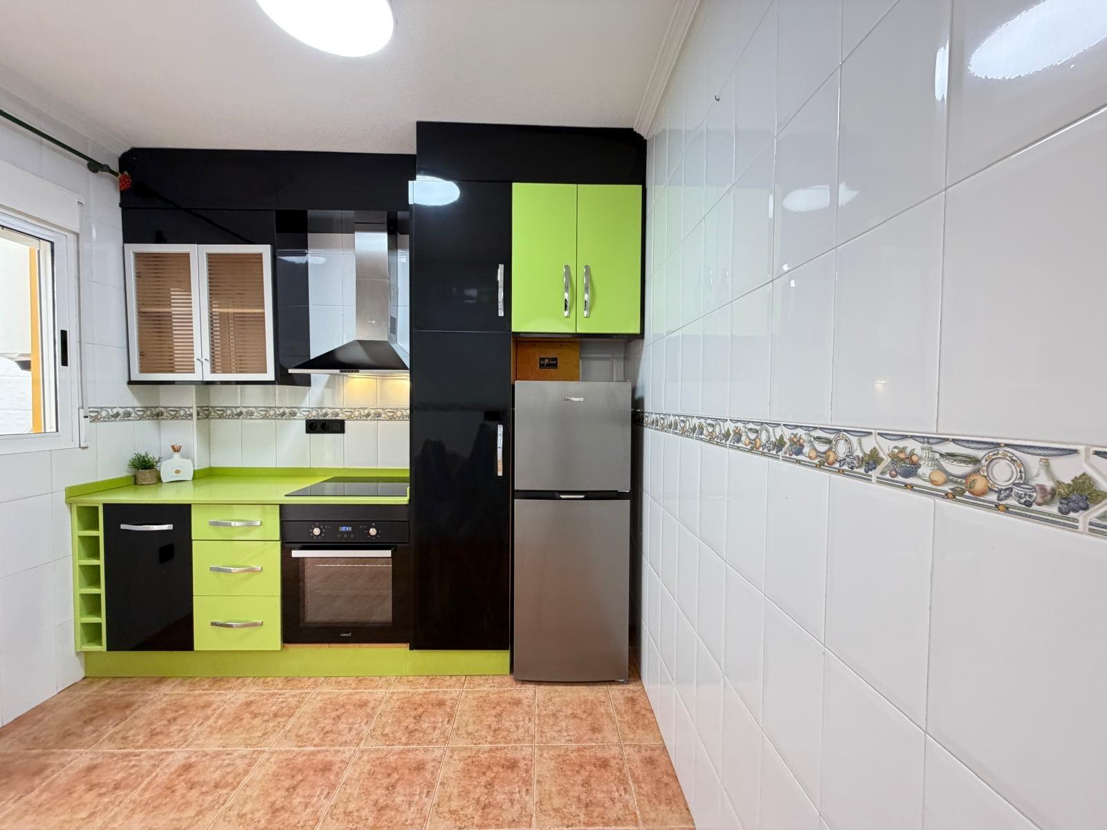 Renovated townhouse in Punta Prima — 3 bedrooms, garden and pool