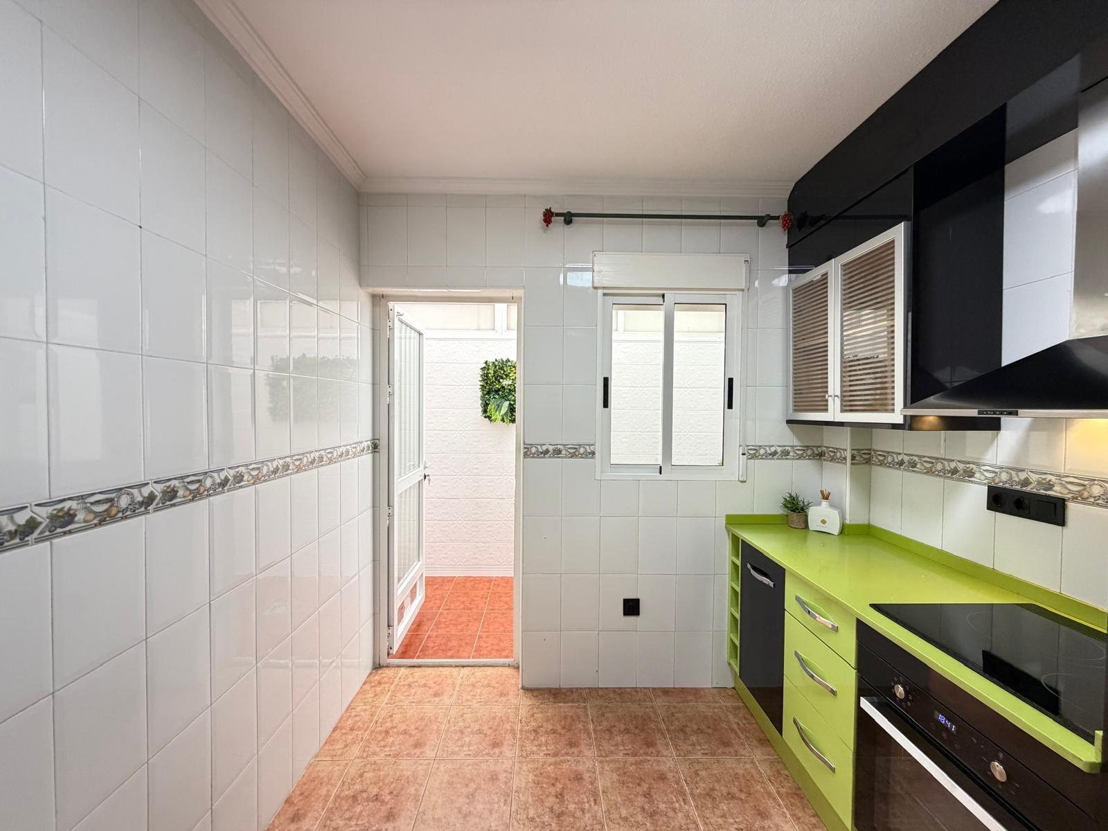 Renovated townhouse in Punta Prima — 3 bedrooms, garden and pool