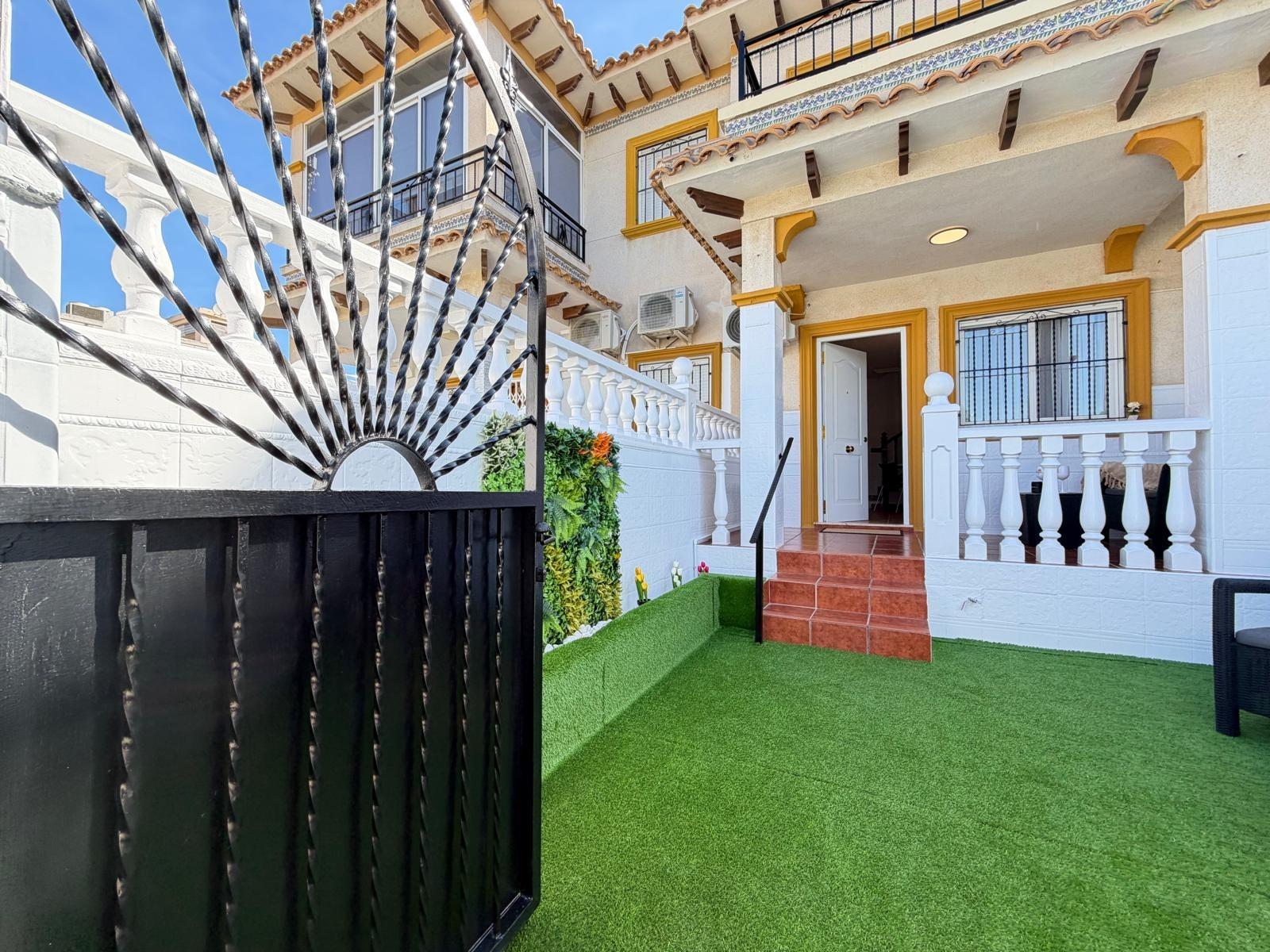 Renovated townhouse in Punta Prima — 3 bedrooms, garden and pool