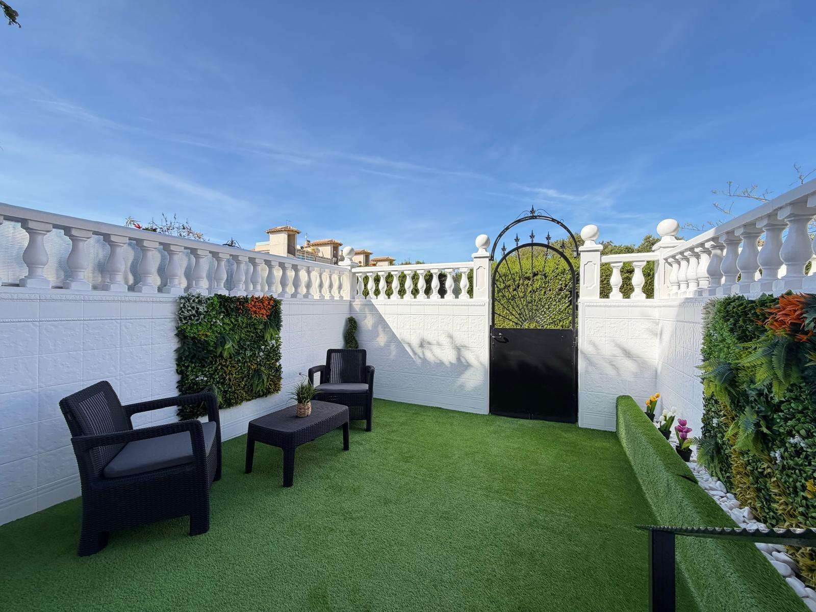 Renovated townhouse in Punta Prima — 3 bedrooms, garden and pool