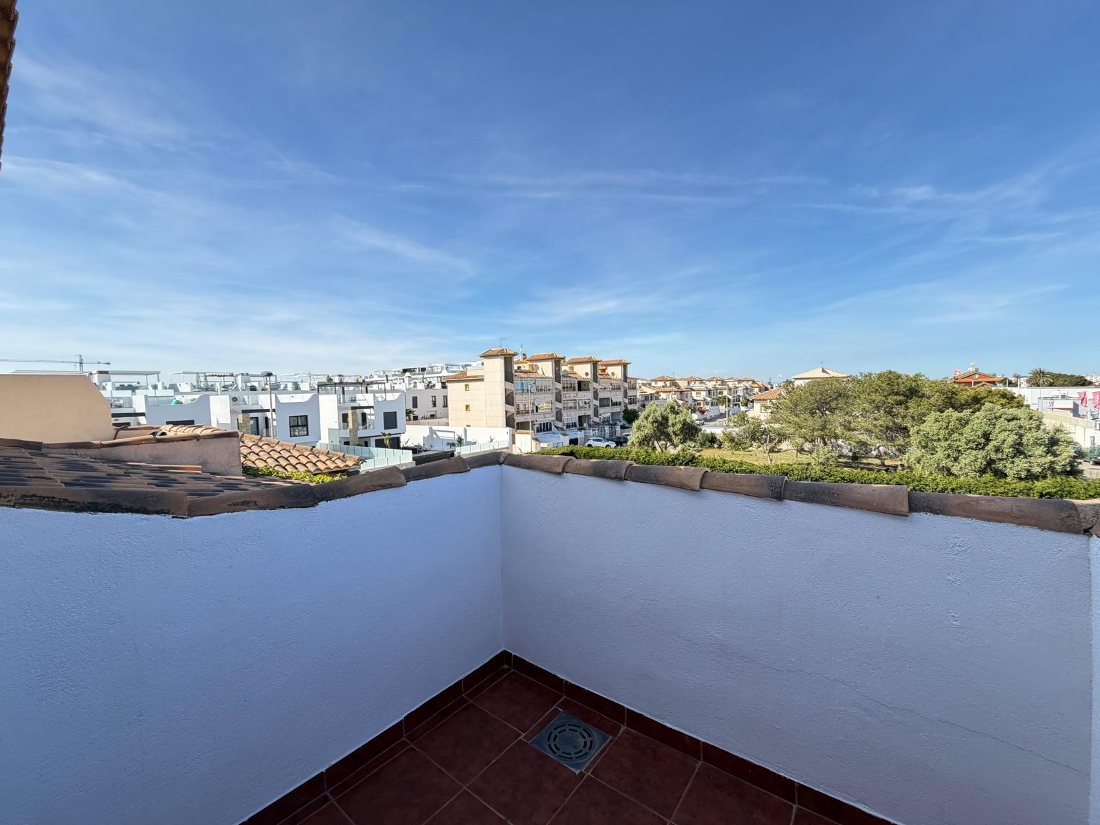 Renovated townhouse in Punta Prima — 3 bedrooms, garden and pool