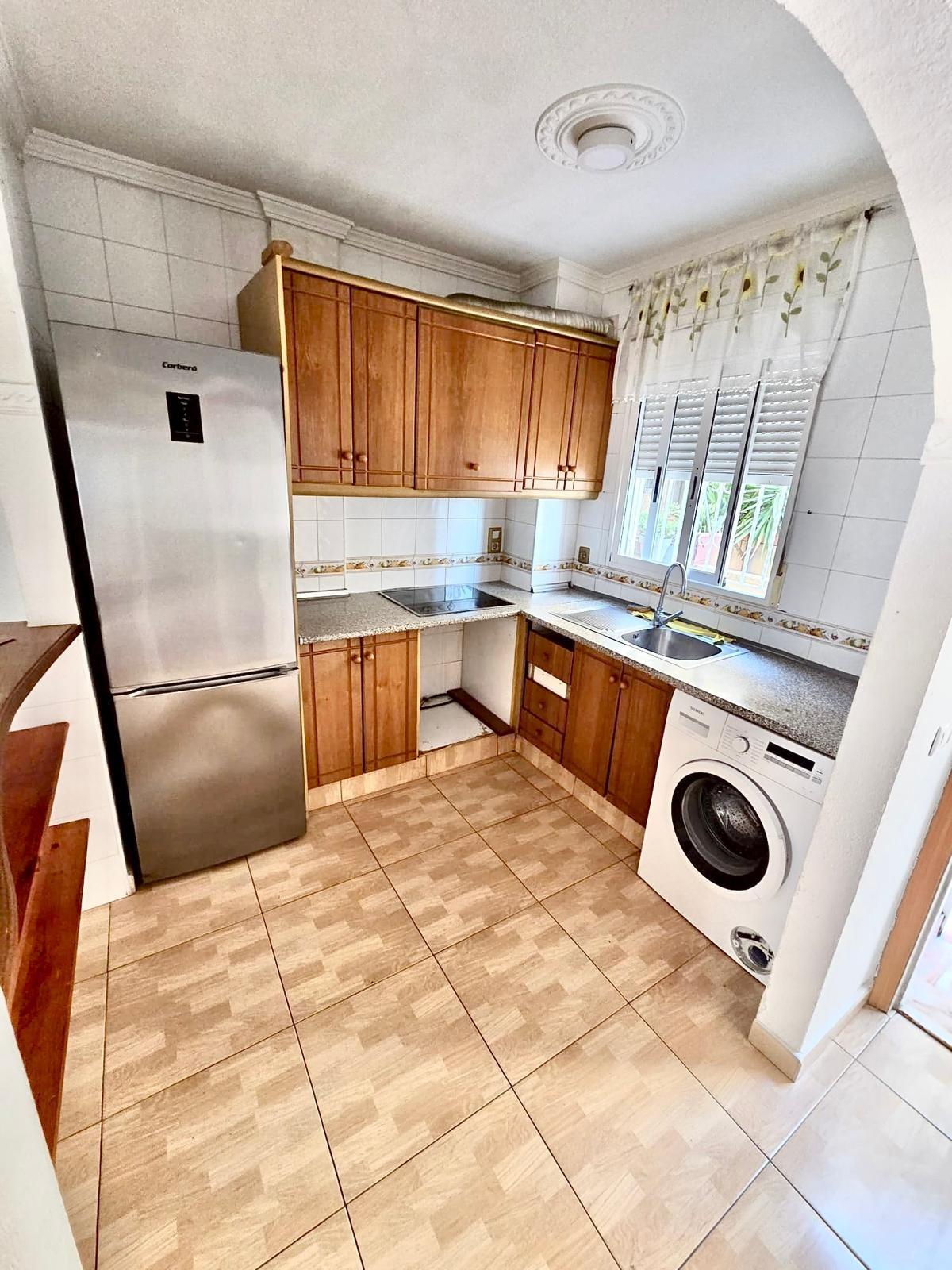 Townhouse with garage, solarium and pool in Laguna, Orihuela Costa