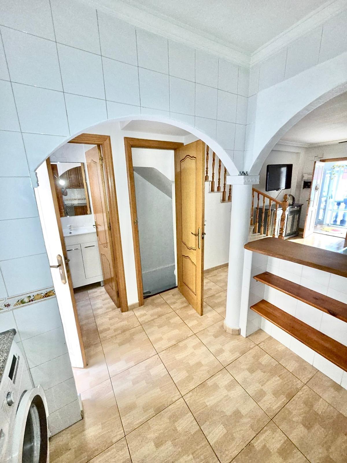Townhouse with garage, solarium and pool in Laguna, Orihuela Costa